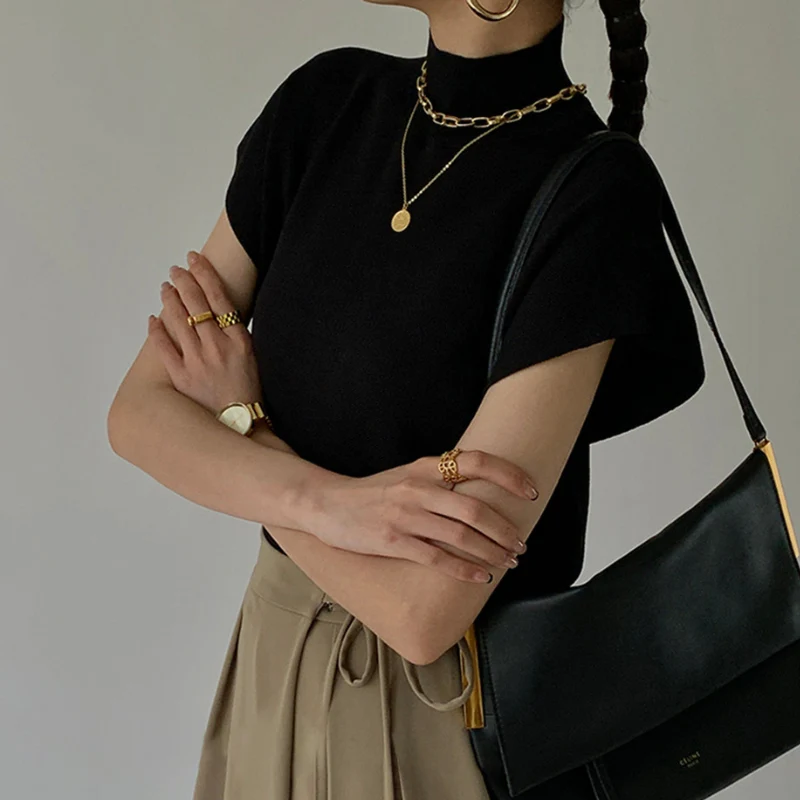 Blouse femme côtelée manches courtes col montant