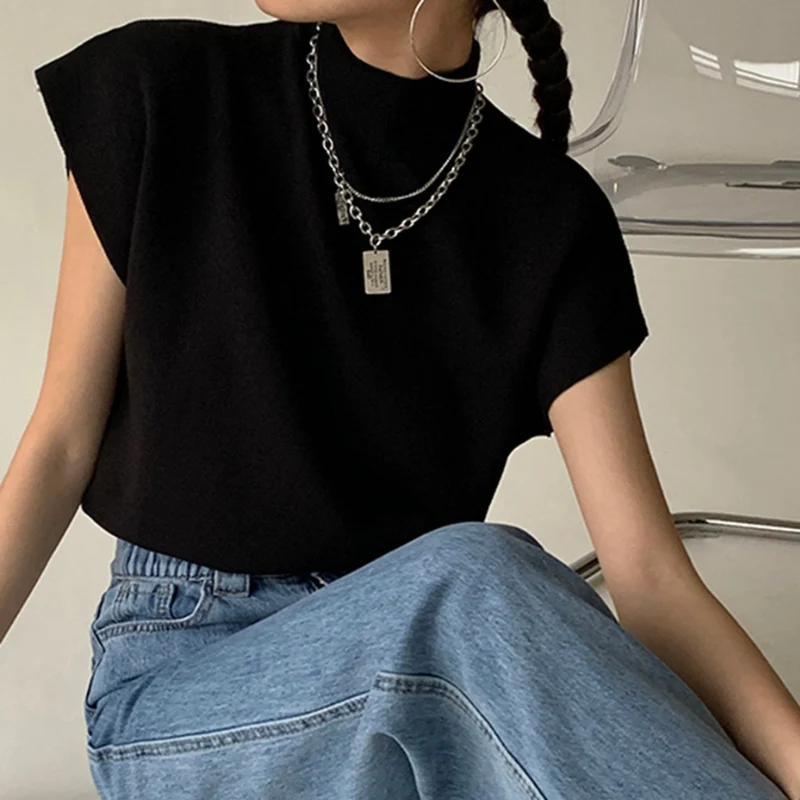 Blouse femme côtelée manches courtes col montant