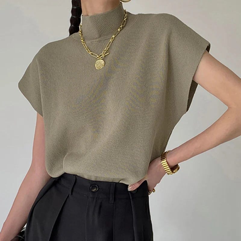 Blouse femme côtelée manches courtes col montant