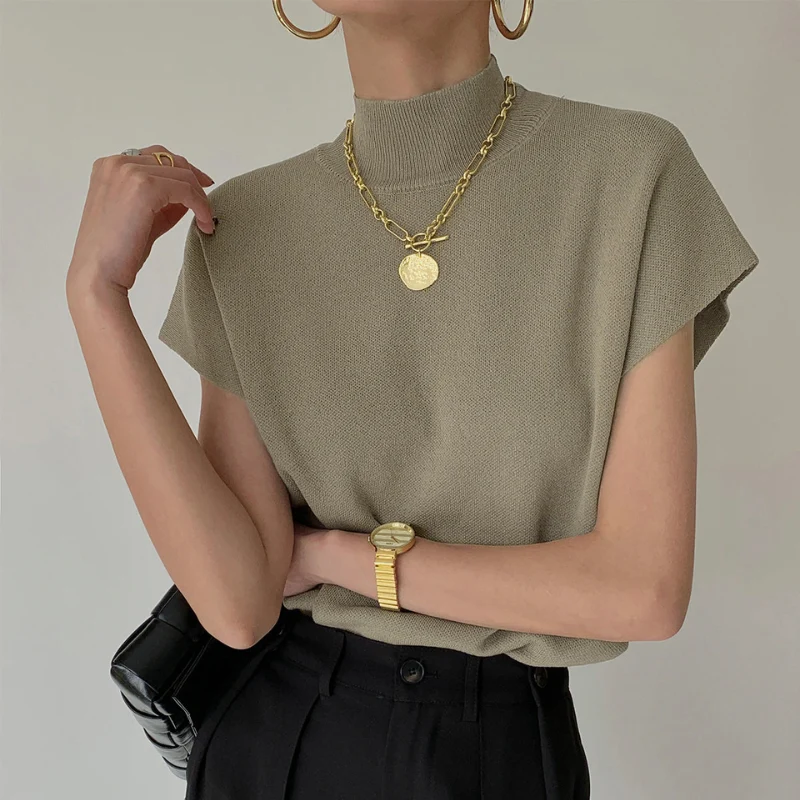 Blouse femme côtelée manches courtes col montant