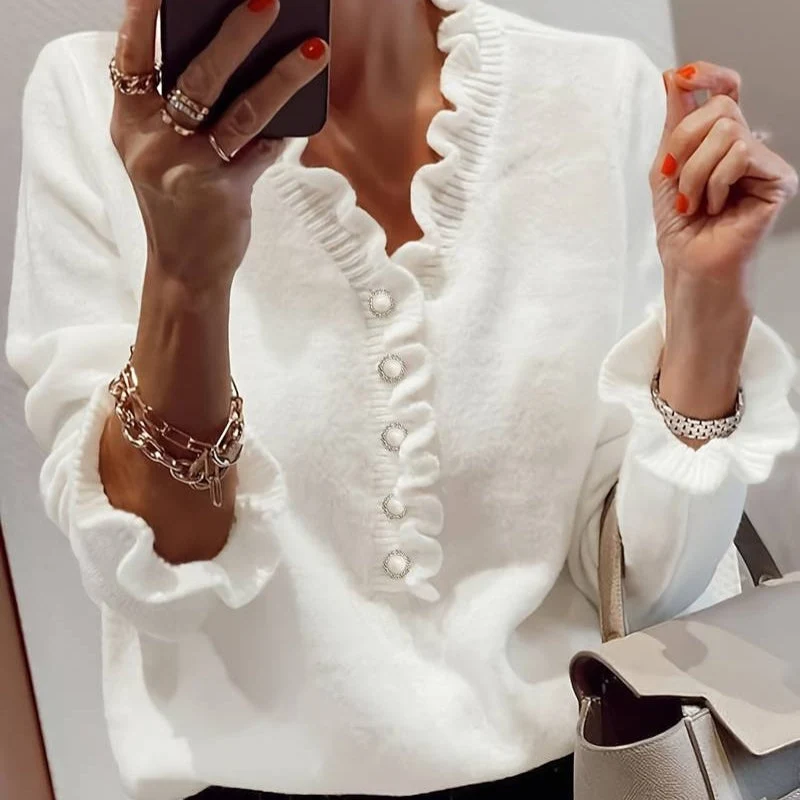Blouse à volants avec boutons décoratifs et manches longues