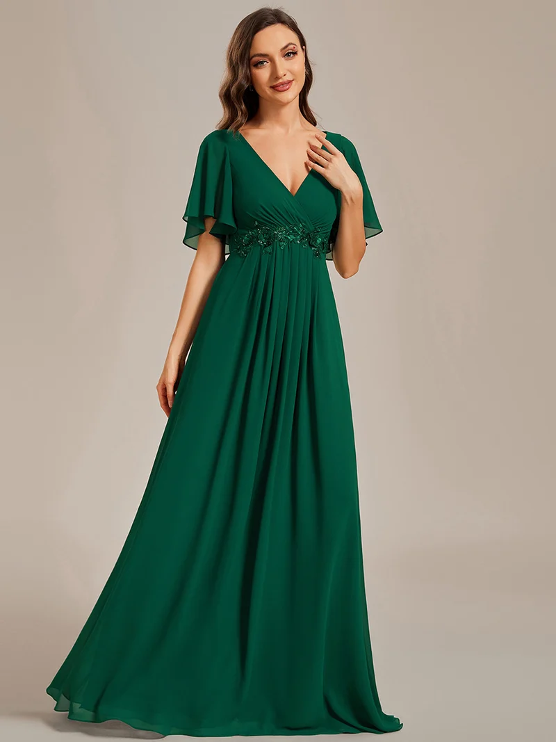 pretty IVYROSE|Robe longue en mousseline avec manches volantées et détails en appliqué