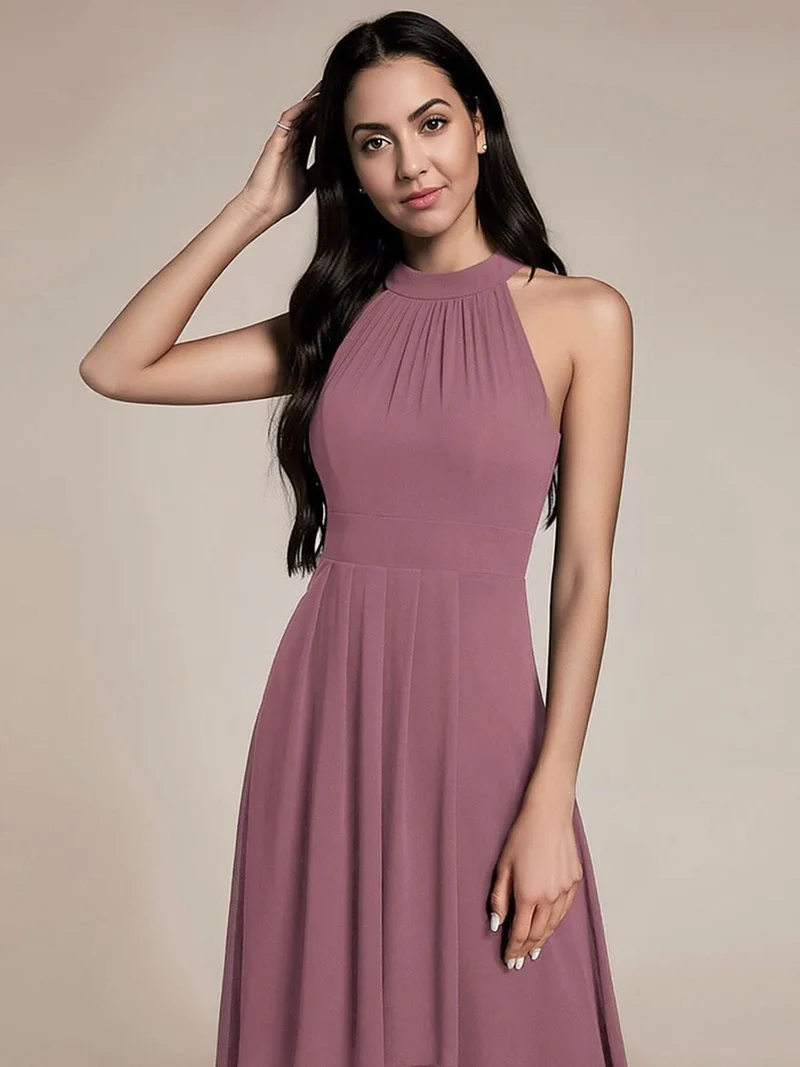 Robe de cocktail rose poudré fluide sans manches