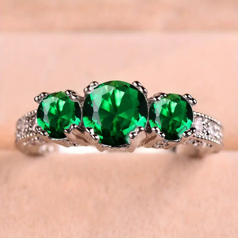 Bague Intemporelle avec Pierres d'Émeraude Brillantes