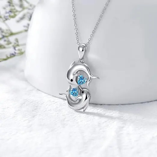 Collier en Argent avec Doubles Dauphins et Cristal Bleu