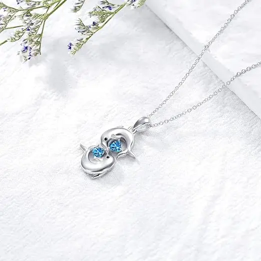 Collier en Argent avec Doubles Dauphins et Cristal Bleu
