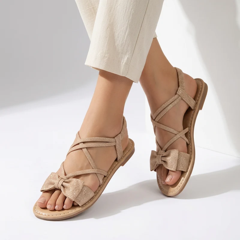 Nouette™ — Sandale plate noeud lacets croisés