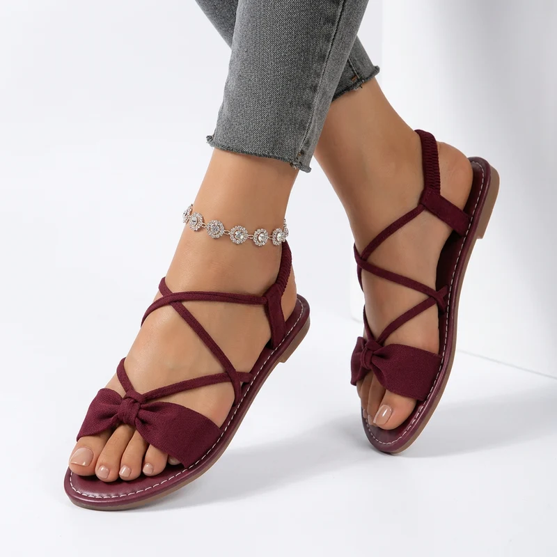 Nouette™ — Sandale plate noeud lacets croisés