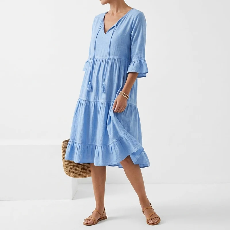 Côtelune™ — Robe smockée col V manches volantées