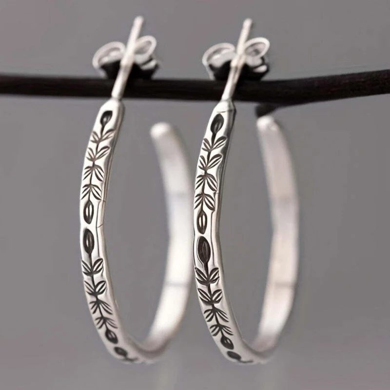 Boucles d'Oreilles Créoles Argentées Élégantes