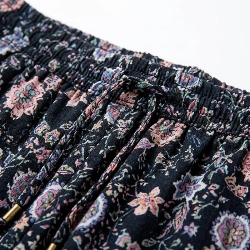 Jupe maxi longue fleurie — taille haute à lacets — tenue de plage