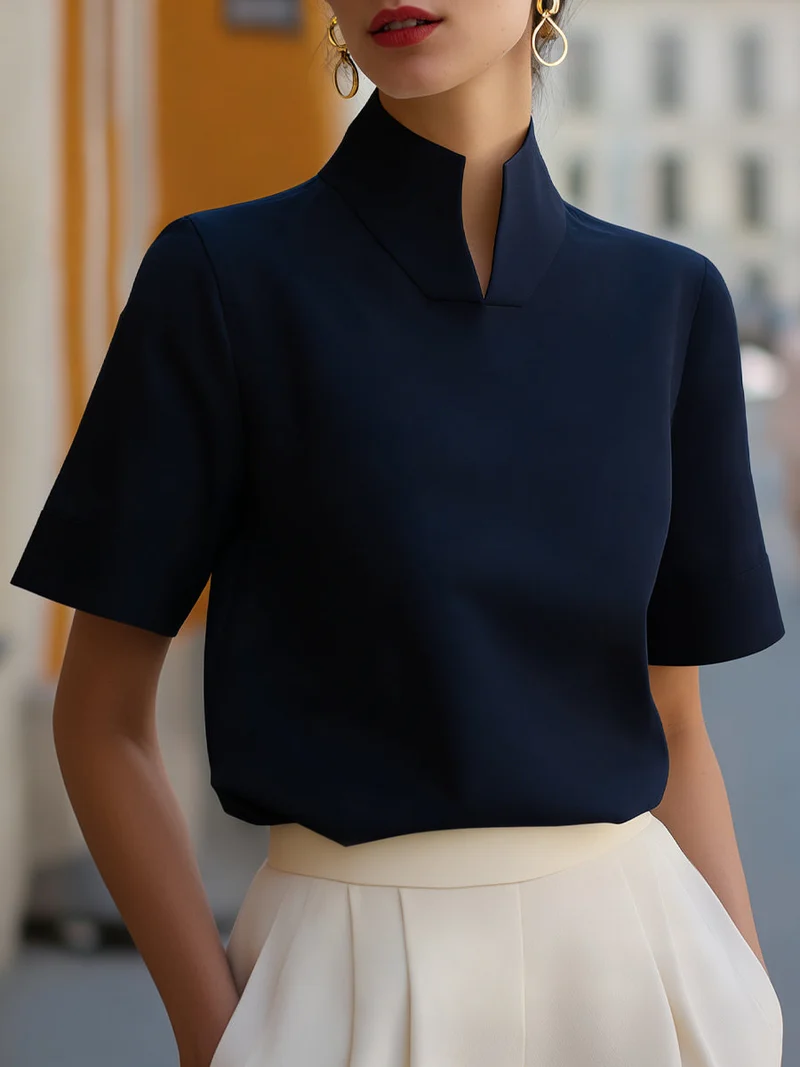 Blouse structurée minimaliste pour femmes à col montant