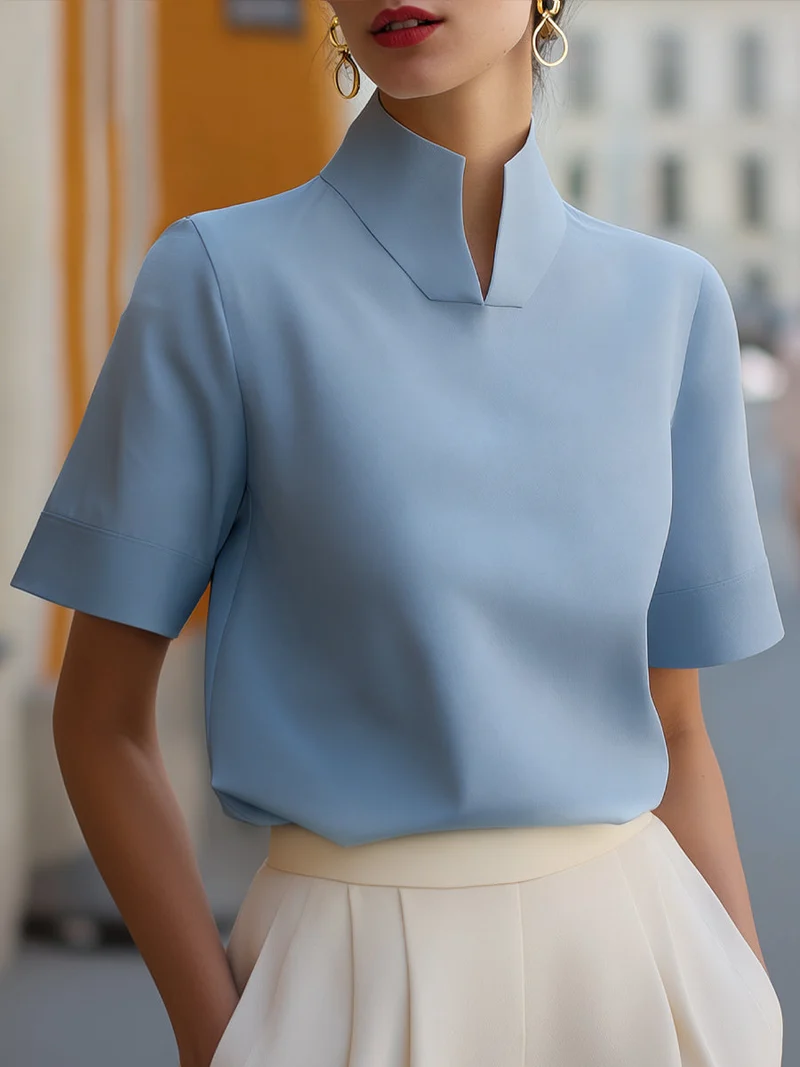 Blouse structurée minimaliste pour femmes à col montant