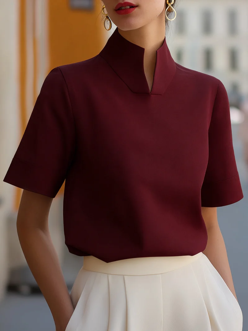 Blouse structurée minimaliste pour femmes à col montant