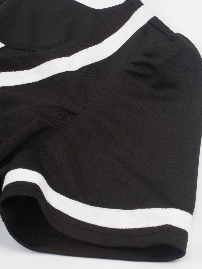 Robe vintage des années 50 à pois avec ceinture et jupe évasée Rockabilly