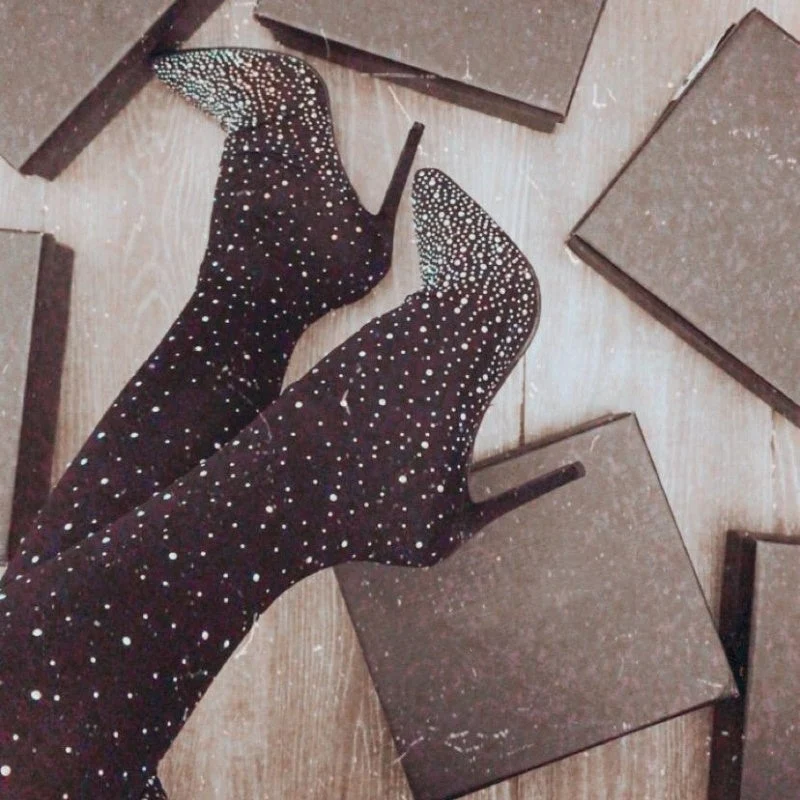 Bottes mi-cuisses étincelantes en faux diamant