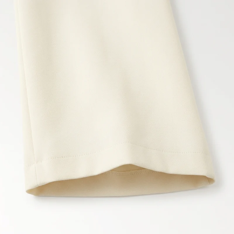 Ensemble femme pantalon large — haut sans manches structuré — mi-saison
