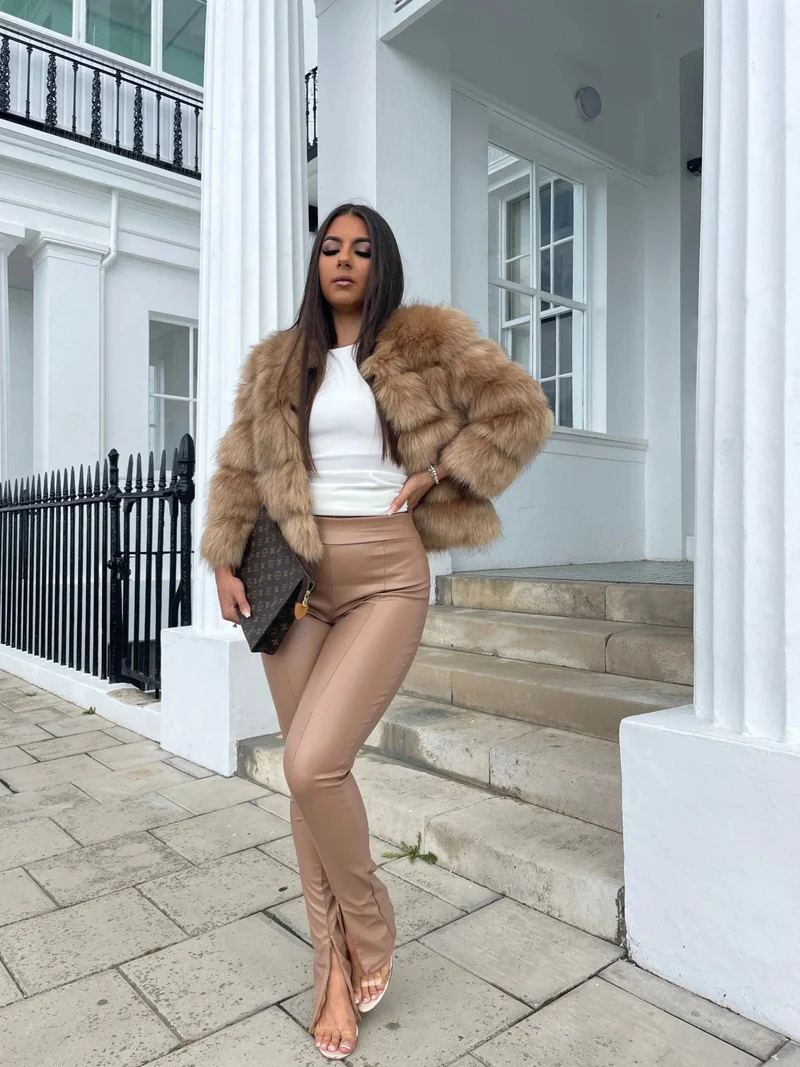 Manteau élégant en fausse fourrure pour femme