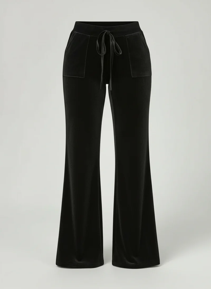 Pantalon évasé taille haute élégant