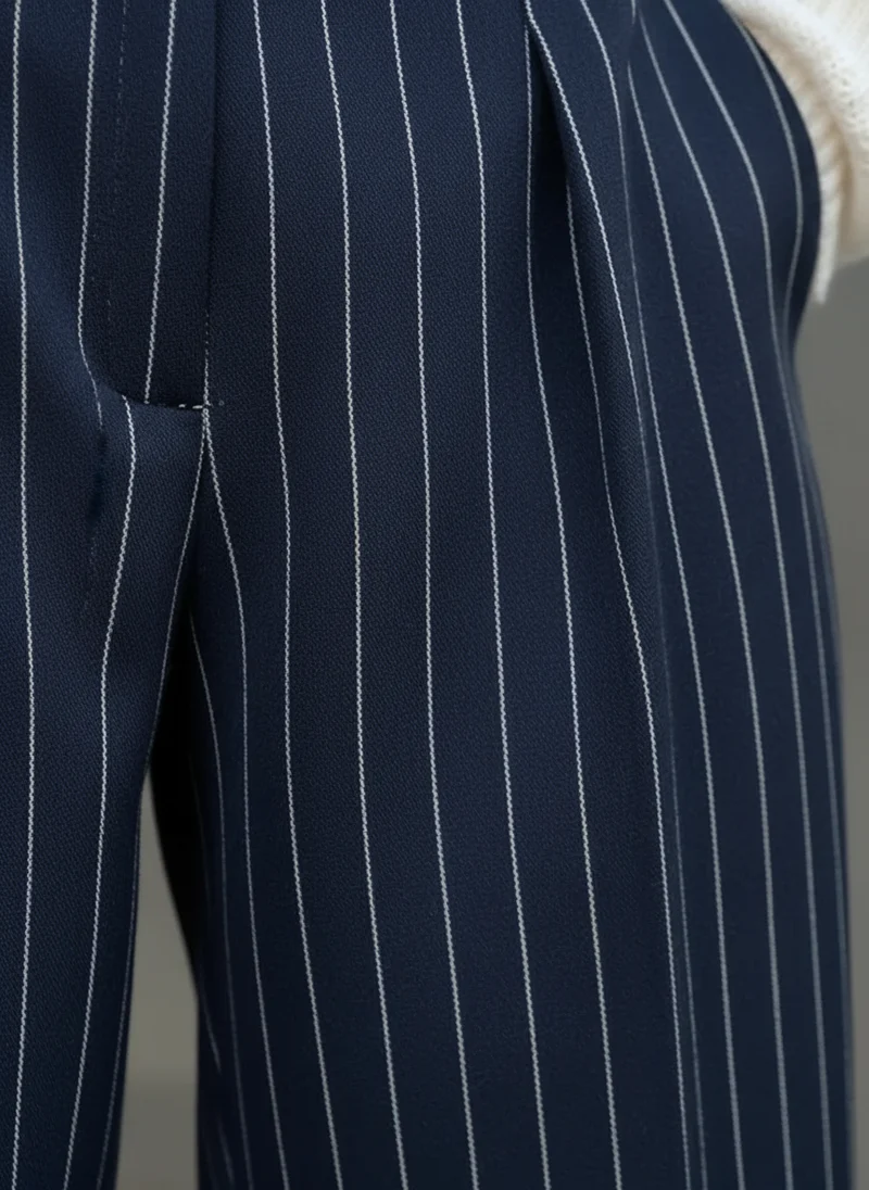 Pantalon large taille haute plissé