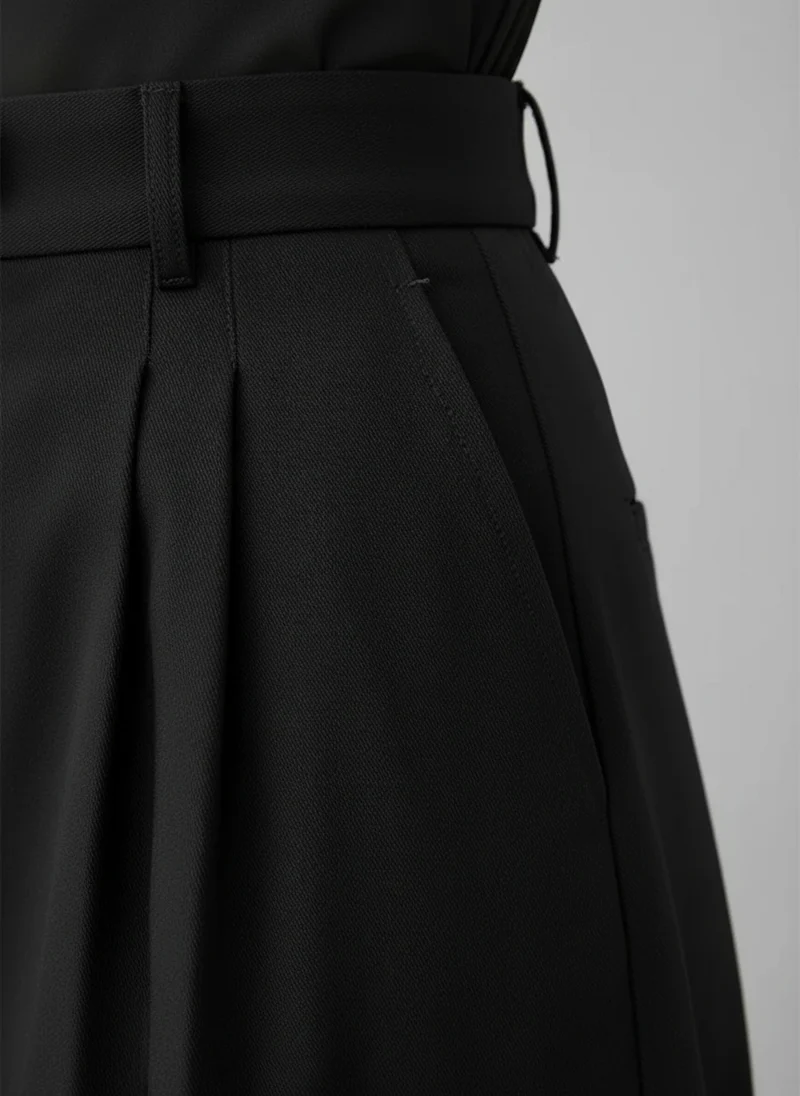 Pantalon large taille haute à plis silhouette fluide