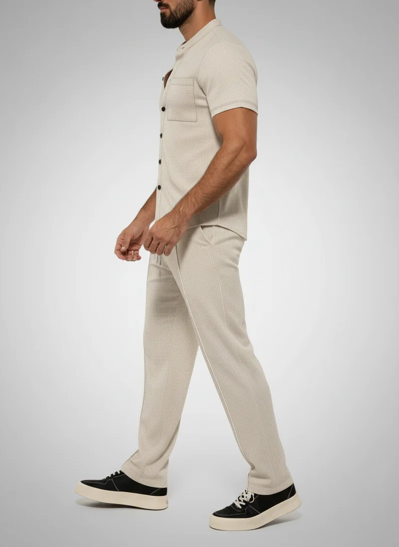 Chemise courte col montant bouton