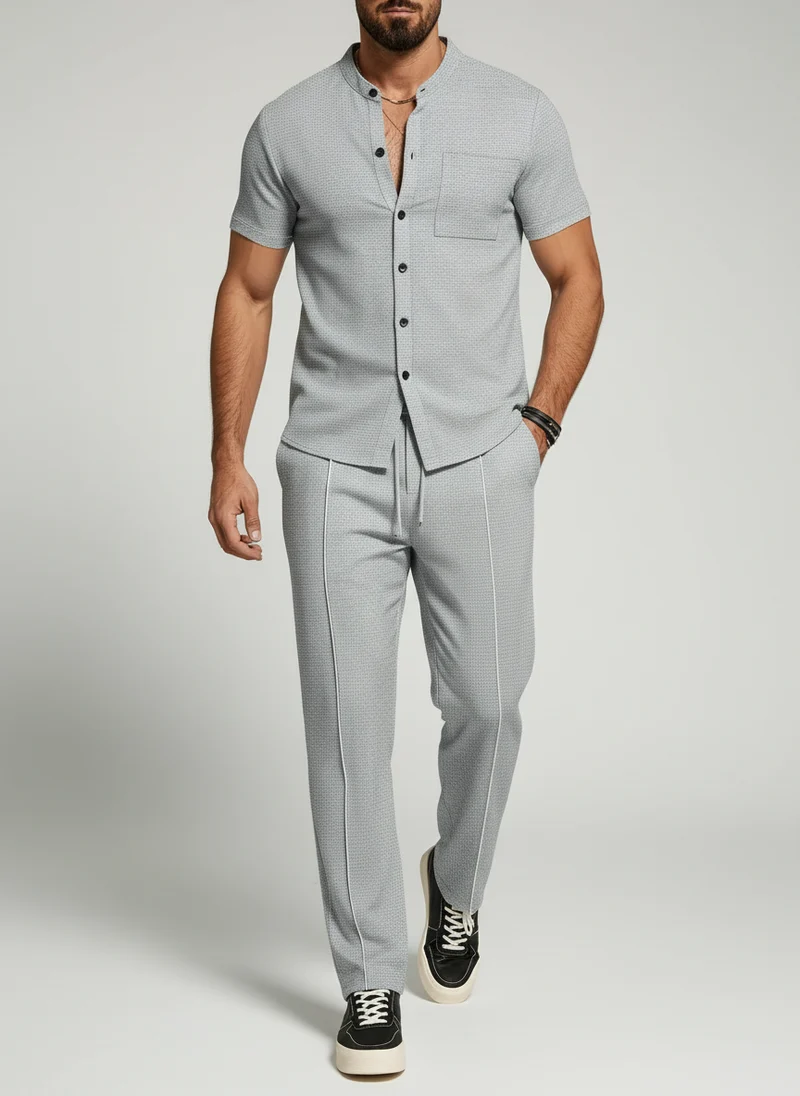 Chemise courte col montant bouton