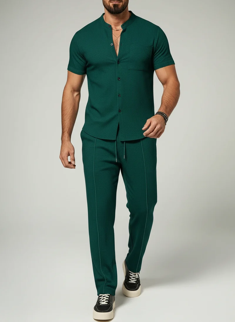 Chemise courte col montant bouton