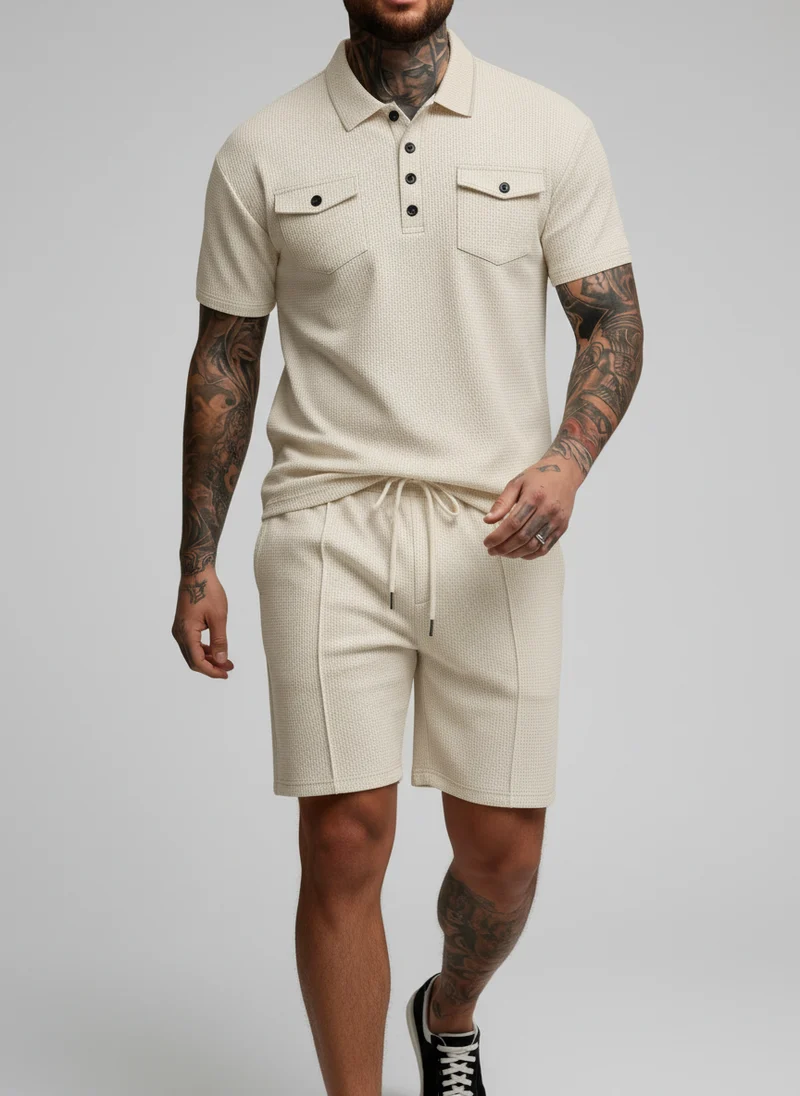 Ensemble polo texturé poches shorts