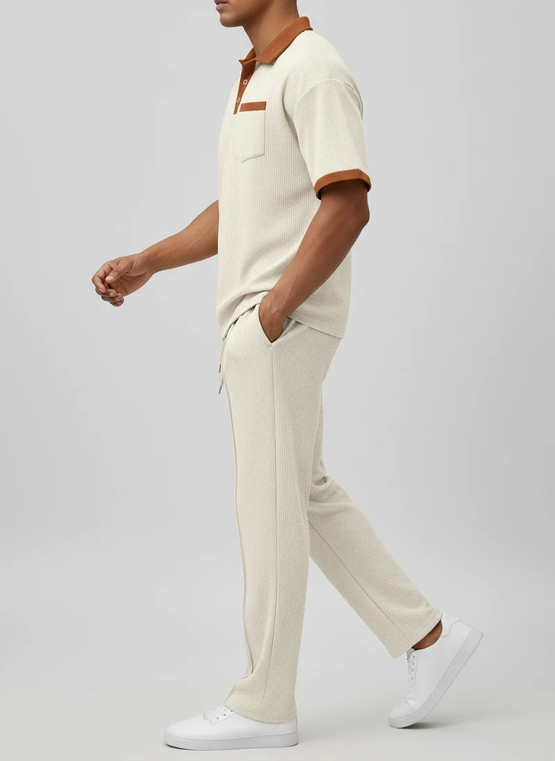 Ensemble polo col contrasté coupe ajustée