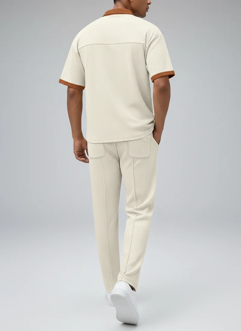 Ensemble polo col contrasté coupe ajustée