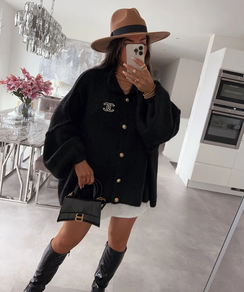 Veste en tricot oversize noire au style cosy