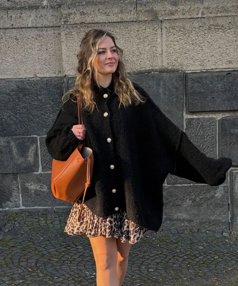 Veste en tricot oversize noire au style cosy