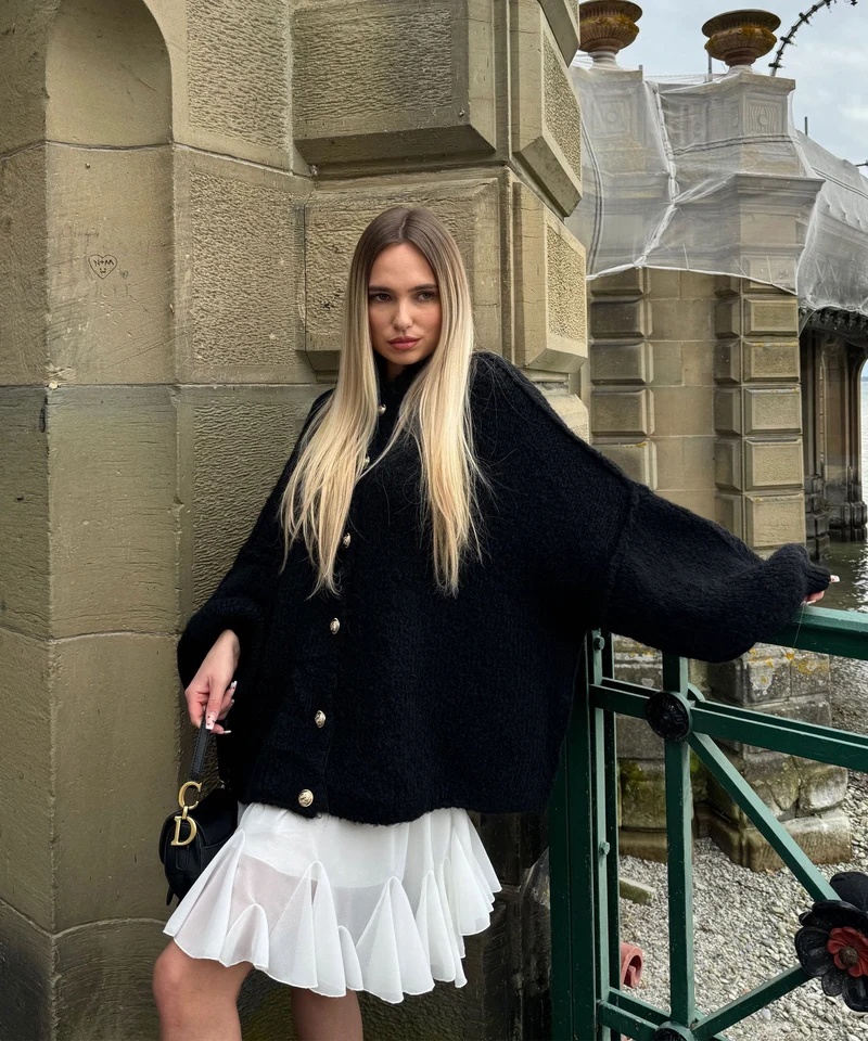 Veste en tricot oversize noire au style cosy
