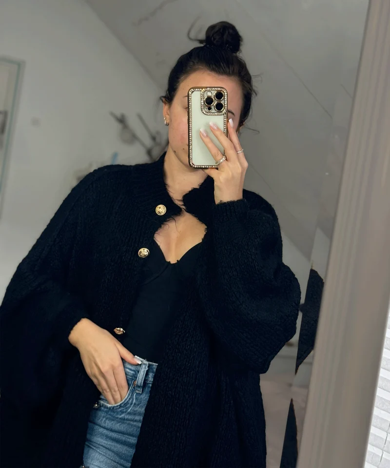 Veste en tricot oversize noire au style cosy