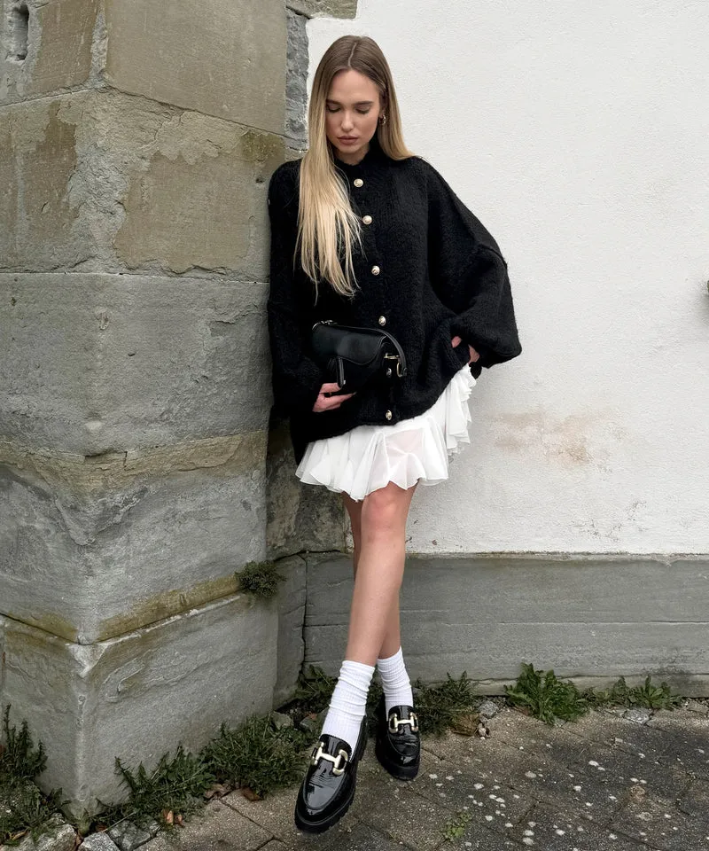 Veste en tricot oversize noire au style cosy