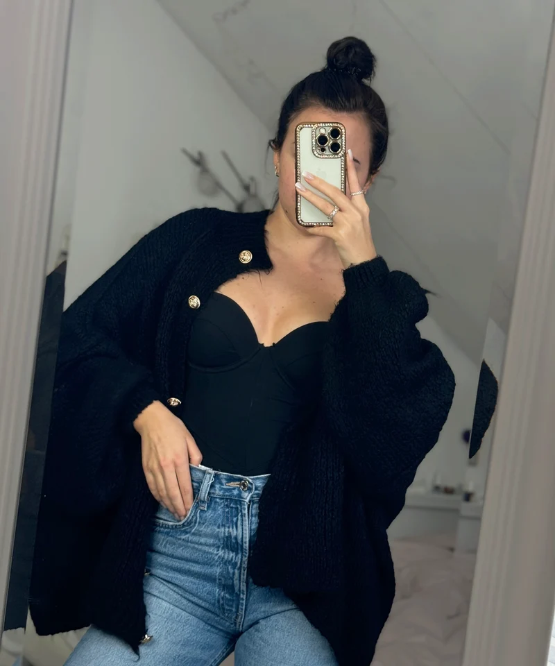 Veste en tricot oversize noire au style cosy
