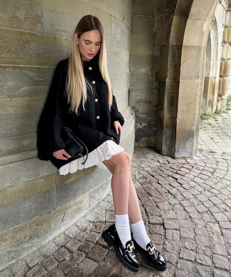 Veste en tricot oversize noire au style cosy
