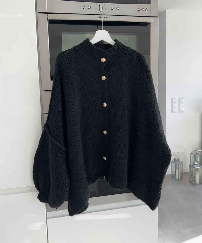 Veste en tricot oversize noire au style cosy