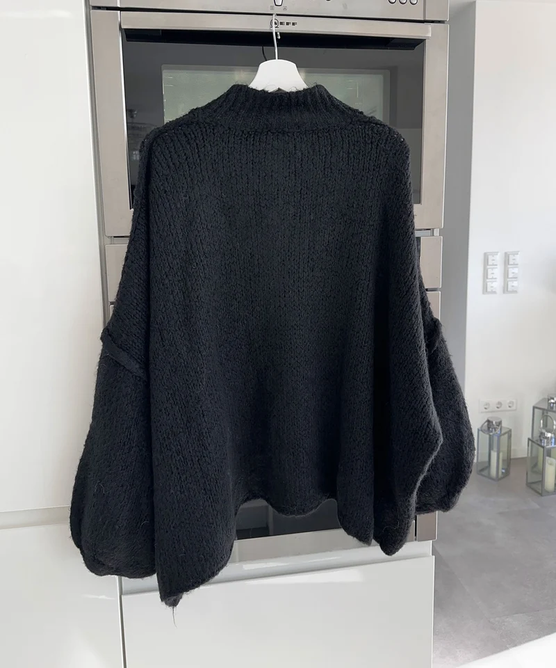 Veste en tricot oversize noire au style cosy