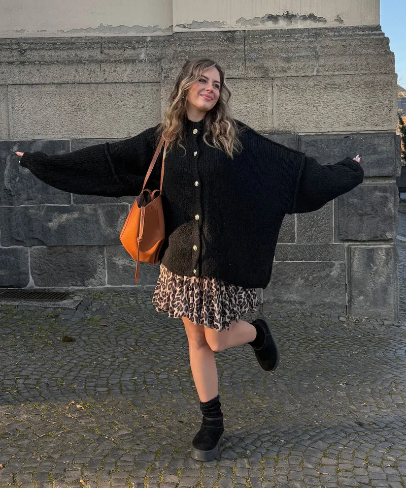 Veste en tricot oversize noire au style cosy