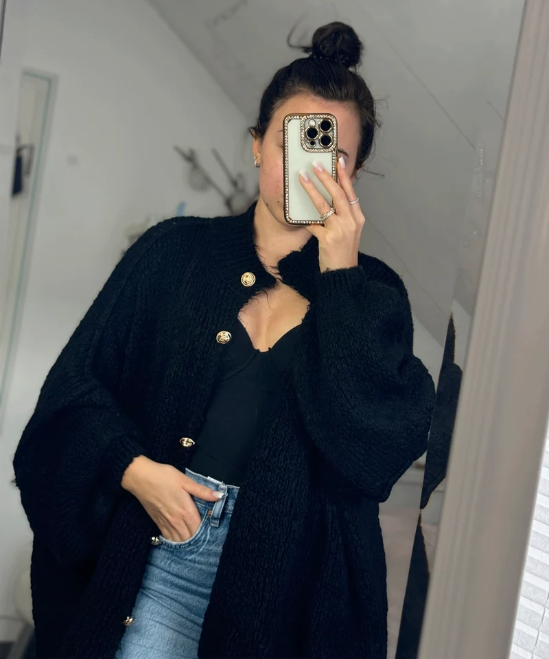 Veste en tricot oversize noire au style cosy