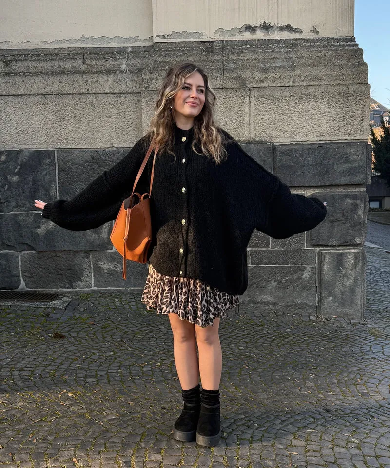Veste en tricot oversize noire au style cosy