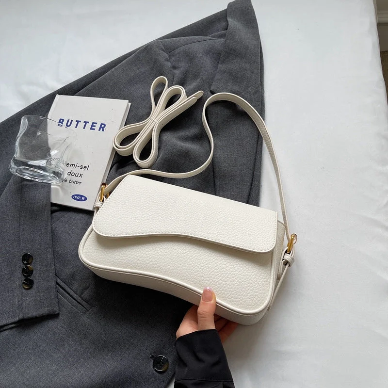 Sac à Main Élégant en Cuir Vegan Premium au Design Ondulé