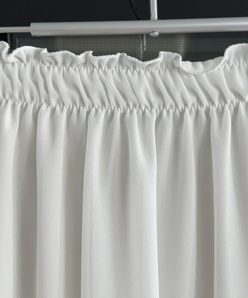 Jupe blanche Nicole au style épuré