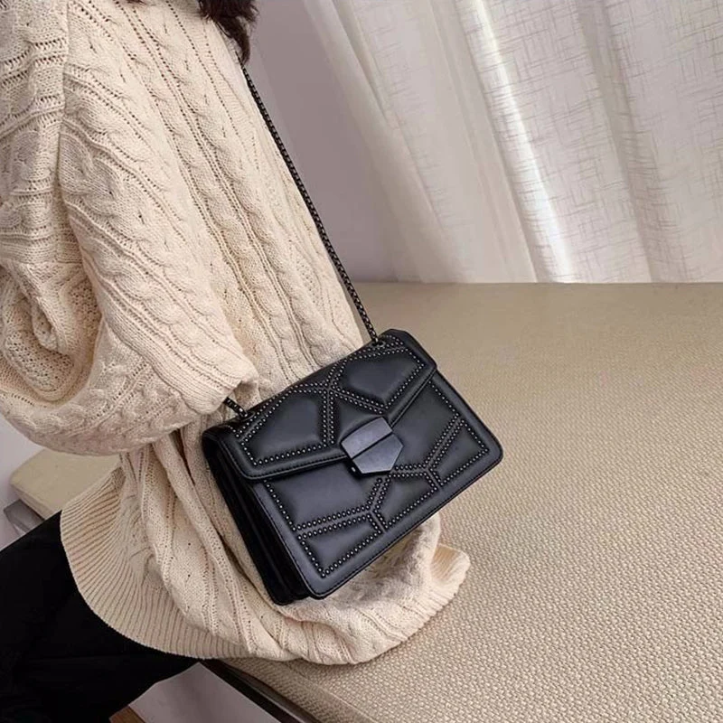 Sac Épaule Matelassé Noir au Style Sophistiqué