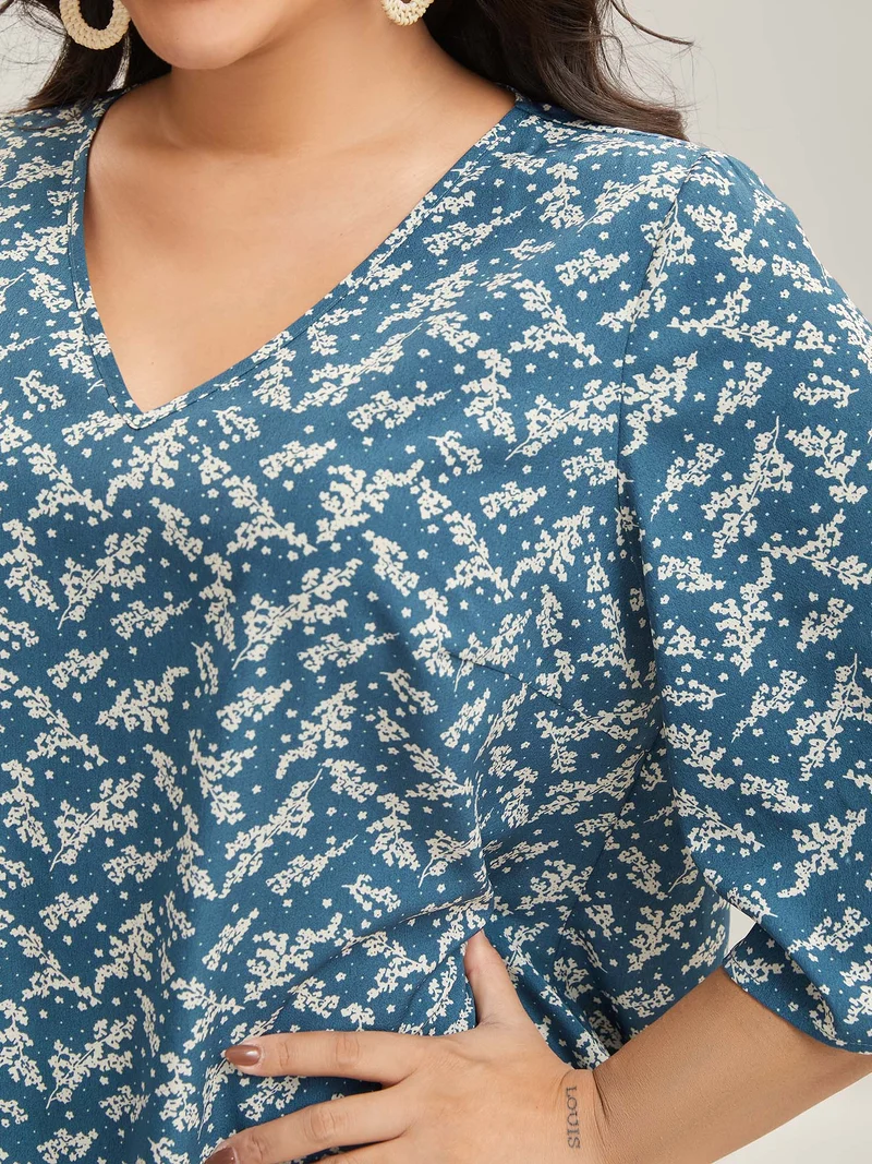 Floral Print Curvy Hem V-Neck Shirt