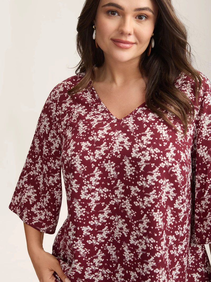 Floral Print Curvy Hem V-Neck Shirt