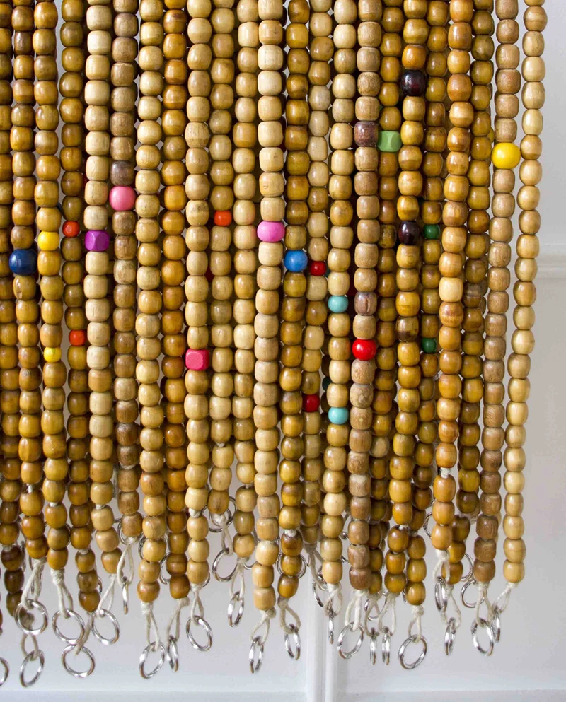 Cordon de téléphone en perles de bois upcyclées
