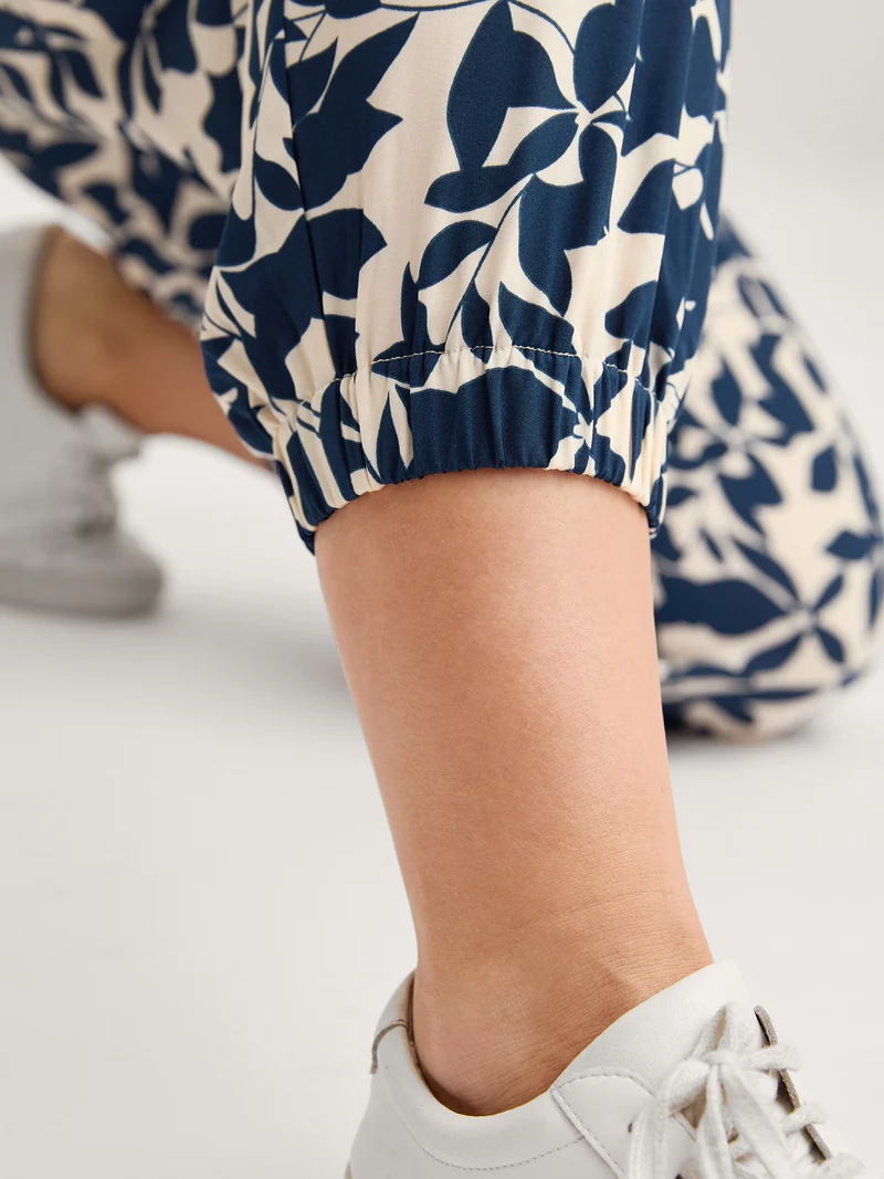 Silhouette Flower Waist-Tie Jogger Pants